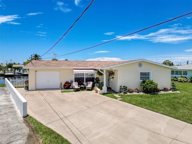 12817 2nd Isle, Hudson, FL 34667 - single story home with a garage, stucco siding, concrete driveway, and a shingled roof