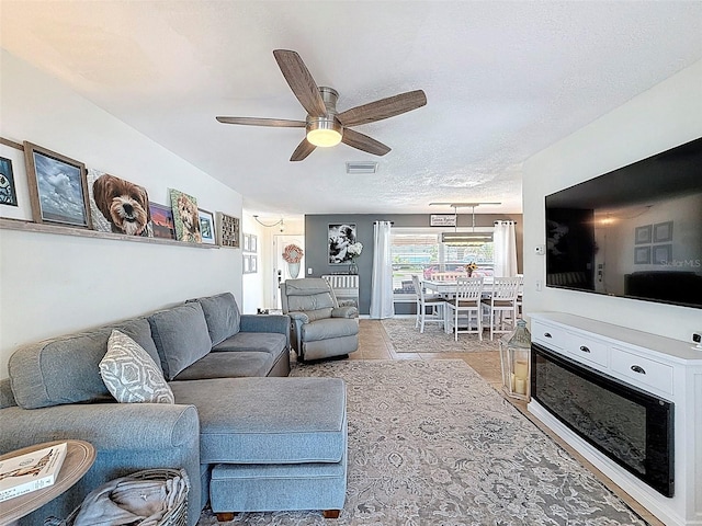 12817 2nd Isle, Hudson, FL 34667 - living area with a ceiling fan