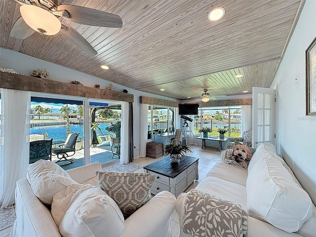 12817 2nd Isle, Hudson, FL 34667 - sunroom featuring wood ceiling, a water view, recessed lighting, and tile patterned floors