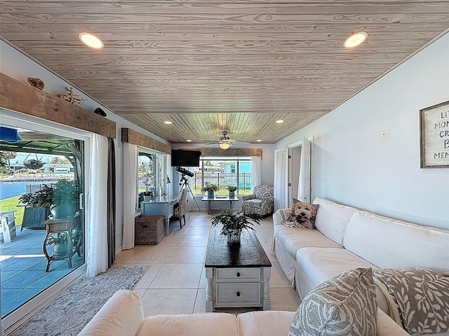 12817 2nd Isle, Hudson, FL 34667 - living room with wooden ceiling, light tile patterned flooring, ceiling fan, and recessed lighting