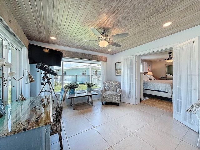 12817 2nd Isle, Hudson, FL 34667 - bedroom with light tile patterned floors, wooden ceiling, recessed lighting, and ceiling fan