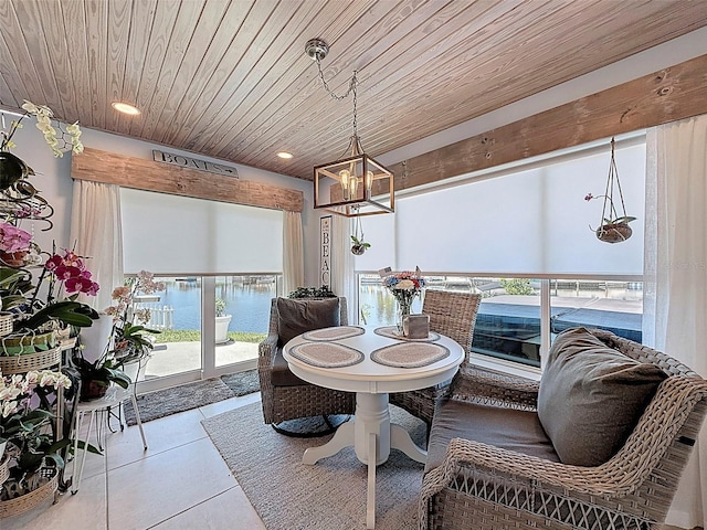 12817 2nd Isle, Hudson, FL 34667 - tiled dining room featuring a chandelier, wooden ceiling, and recessed lighting