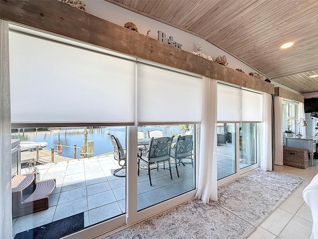 12817 2nd Isle, Hudson, FL 34667 - unfurnished sunroom with a water view and vaulted ceiling