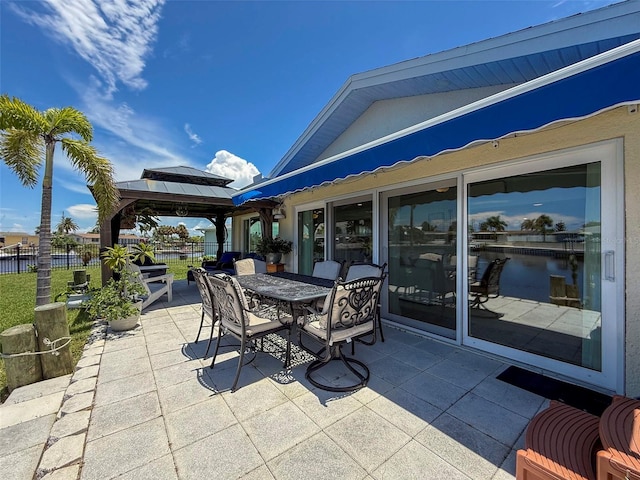 12817 2nd Isle, Hudson, FL 34667 - view of patio featuring a gazebo and outdoor dining area