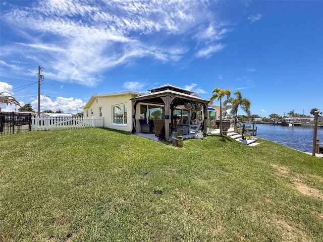 12817 2nd Isle, Hudson, FL 34667 - back of house with a gazebo and a water view