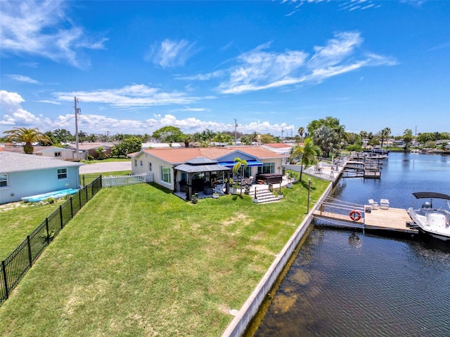 12817 2nd Isle, Hudson, FL 34667 - dock with a water view and a fenced backyard
