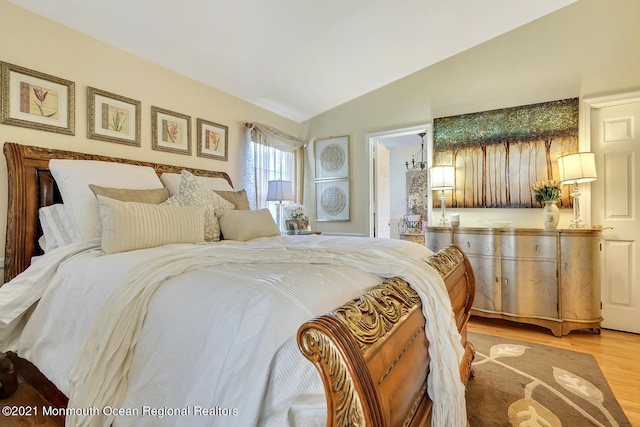 38 Sweet Gum Rd, Howell, NJ 07731 - bedroom with light wood-style flooring and lofted ceiling