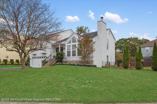 38 Sweet Gum Rd, Howell, NJ 07731 - view of front of home featuring a garage, a chimney, and driveway