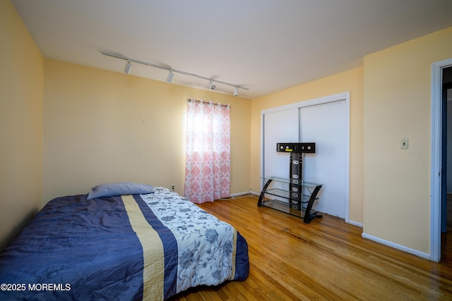 bedroom featuring hardwood / wood-style floors