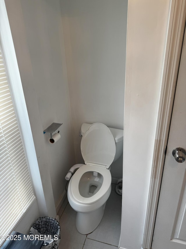 115 Washington St, Long Branch, NJ 07740 - bathroom with toilet and tile patterned flooring
