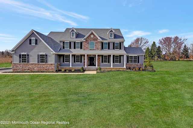 view of front of home with a front yard