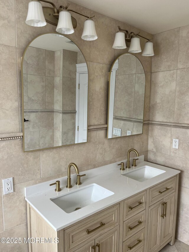 1615 Ocean Ave, Point Pleasant Beach, NJ 08742 - full bath featuring tile walls, double vanity, and decorative backsplash