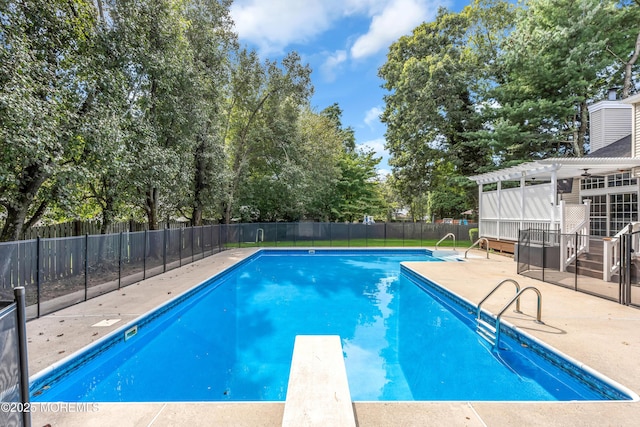 view of swimming pool with a fenced in pool, a patio area, fence, and a pergola