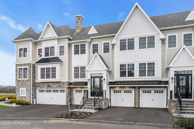 townhome / multi-family property featuring a garage