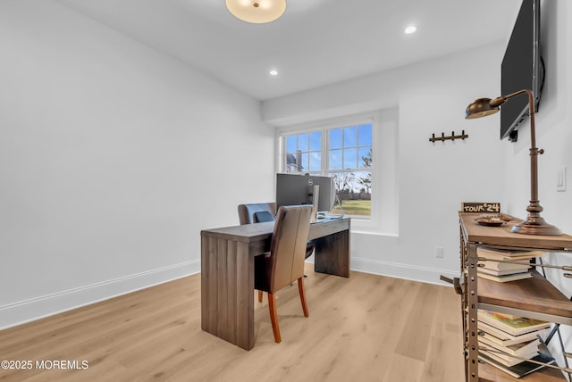 office area with light wood-type flooring