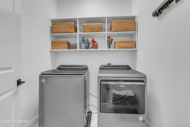 laundry room with washing machine and dryer