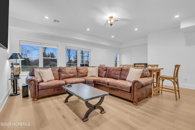 living room featuring light wood-type flooring