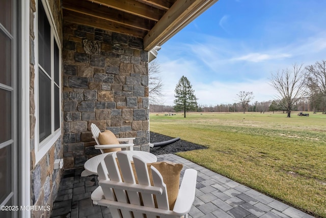 view of patio with a rural view