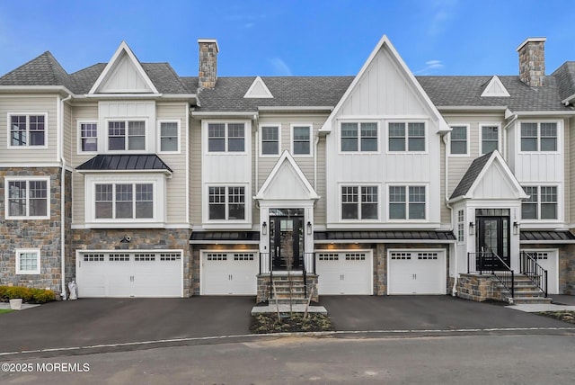 townhome / multi-family property featuring a garage