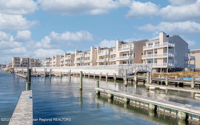 dock area featuring a water view