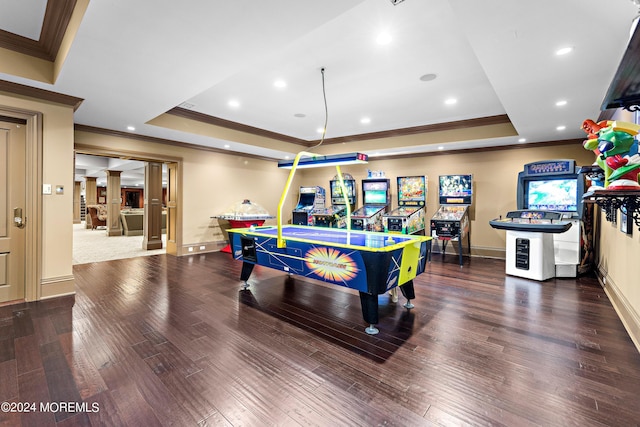 playroom with decorative columns, wood-type flooring, pool table, a tray ceiling, and crown molding