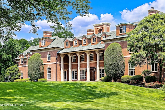 view of front of home with a front yard