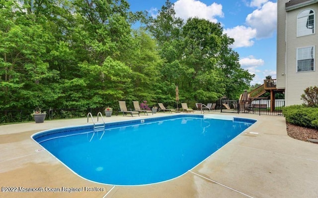 view of pool with a patio