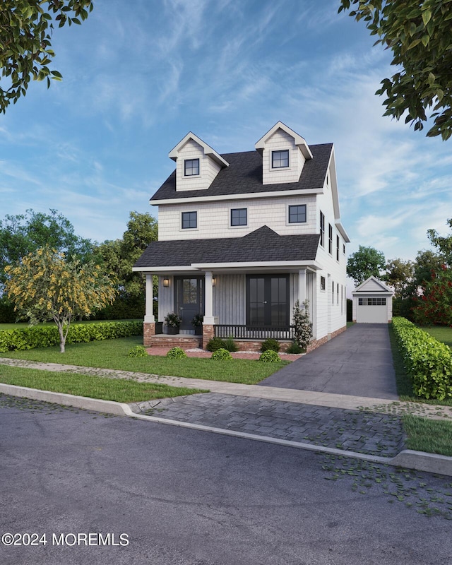 view of front of property with an outdoor structure, a garage, a front lawn, and covered porch