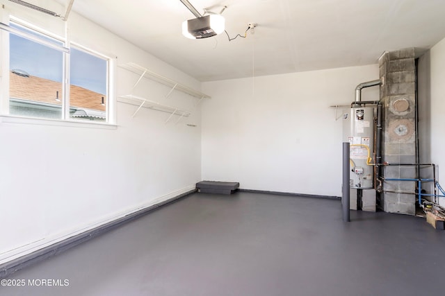 garage with a garage door opener and water heater