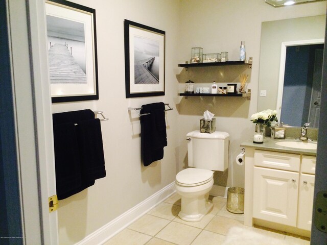 22 Cooper Ave Unit 105, Long Branch, NJ 07740 - bathroom with tile floors, toilet, and vanity