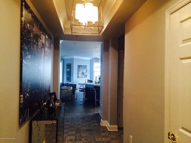 22 Cooper Ave Unit 105, Long Branch, NJ 07740 - corridor featuring ornamental molding and an inviting chandelier