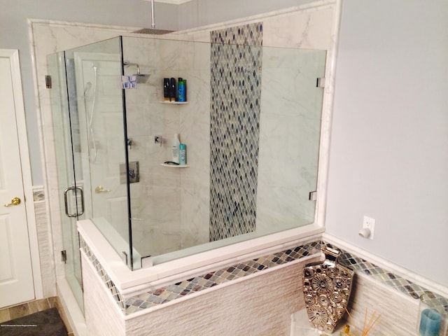 22 Cooper Ave Unit 105, Long Branch, NJ 07740 - bathroom with an enclosed shower