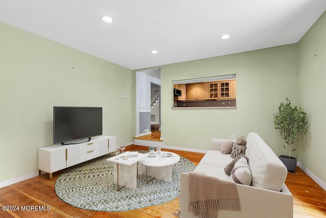 living room with light hardwood / wood-style floors