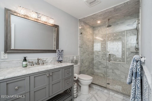 bathroom with vanity, visible vents, a shower stall, toilet, and marble finish floor