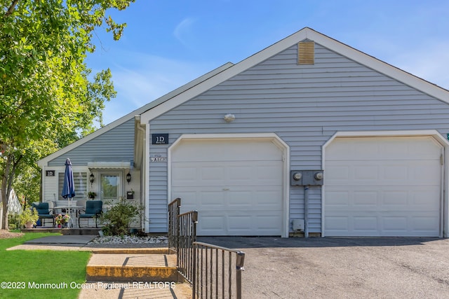 single story home with a garage