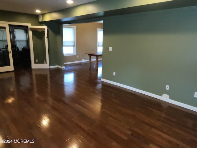 empty room featuring dark hardwood / wood-style floors