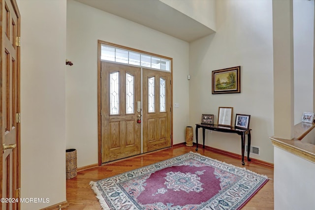 entrance foyer with hardwood / wood-style flooring