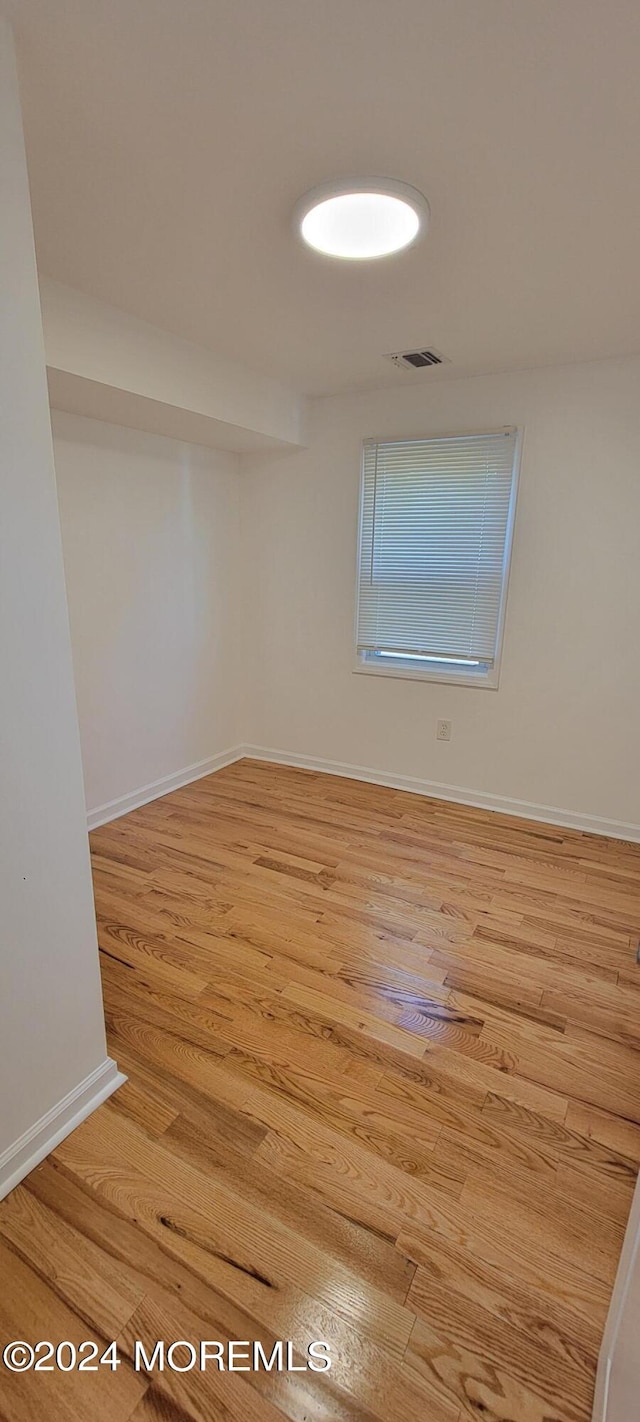 empty room featuring light hardwood / wood-style floors