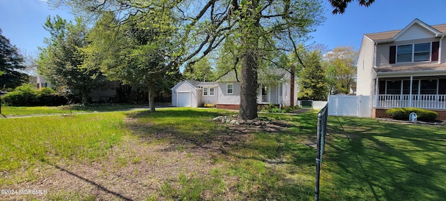 view of yard featuring a garage