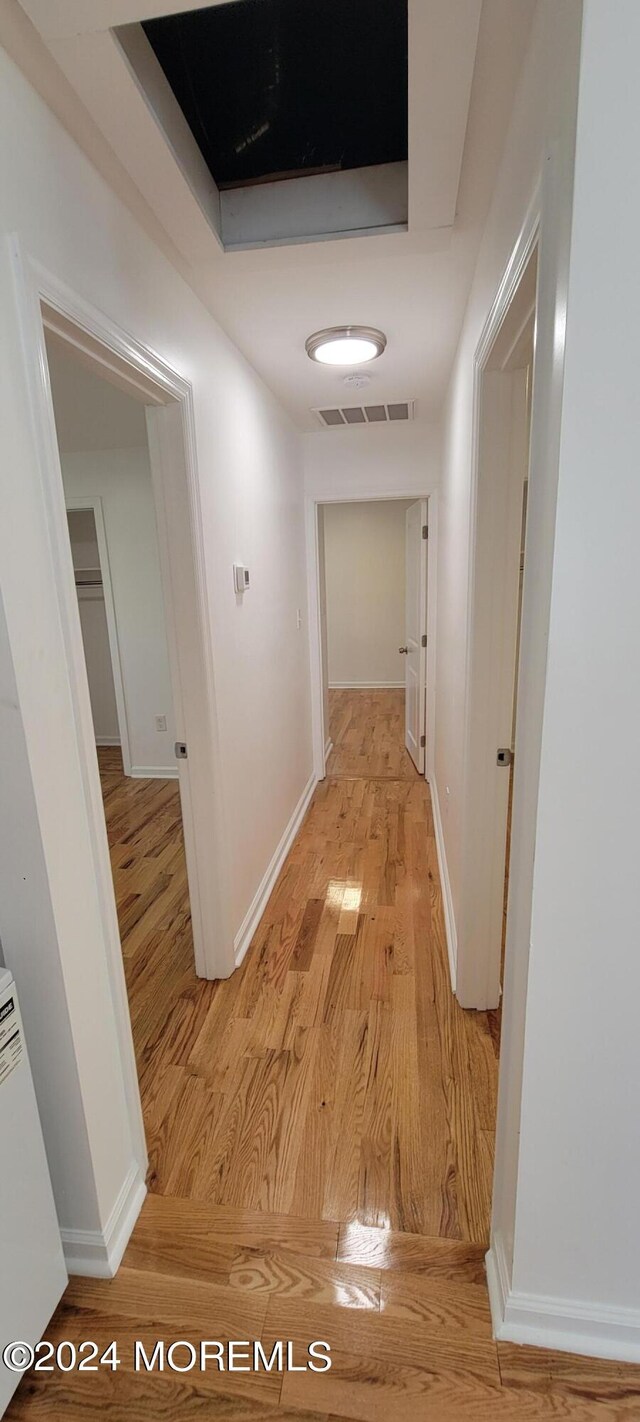 hall featuring light hardwood / wood-style flooring