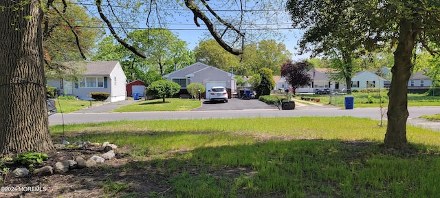 view of yard featuring a garage