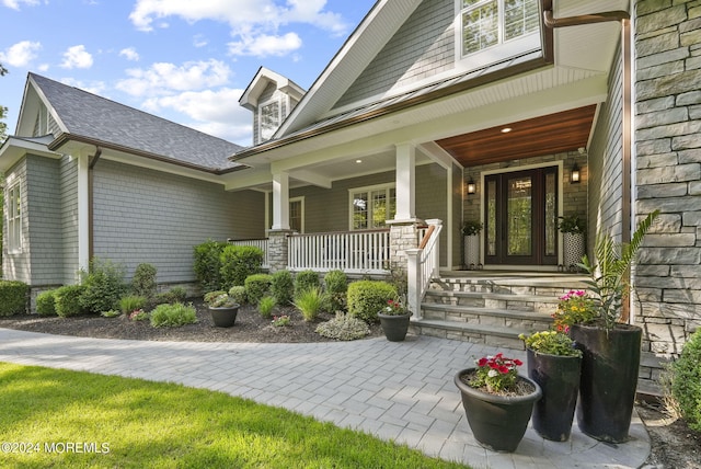 entrance to property with a porch