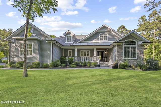 view of front facade with a porch and a front yard