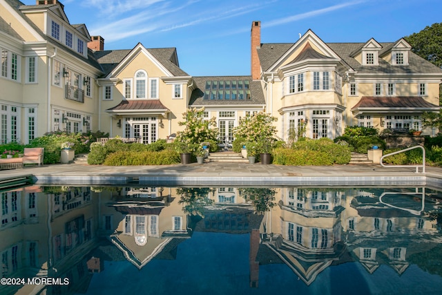 back of property with french doors