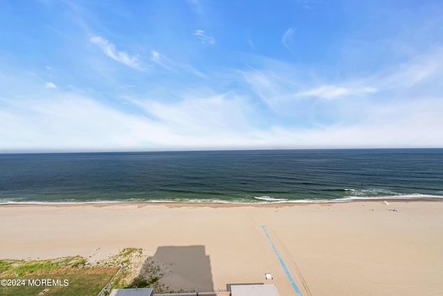 view of water feature with a beach view