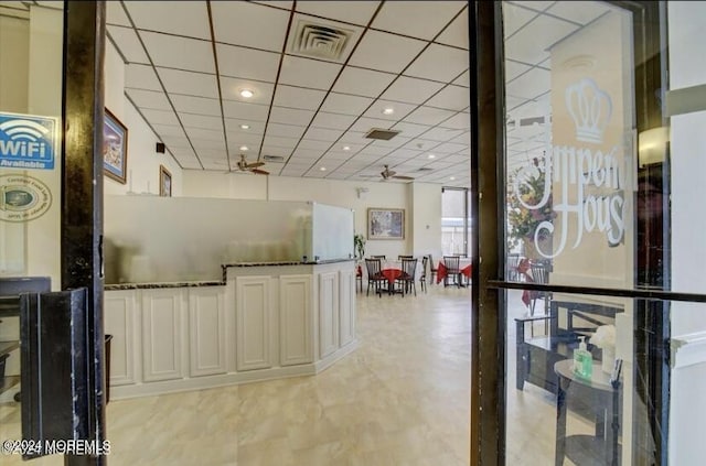 reception area with ceiling fan