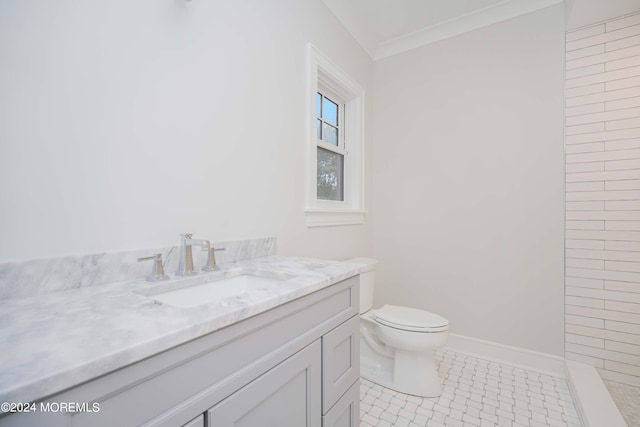 bathroom featuring vanity, tile patterned floors, walk in shower, crown molding, and toilet