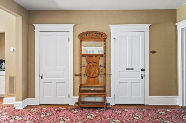 entrance foyer featuring hardwood / wood-style flooring