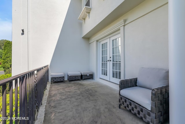 balcony featuring french doors