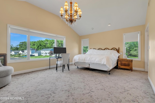 bedroom with carpet flooring, high vaulted ceiling, and an inviting chandelier